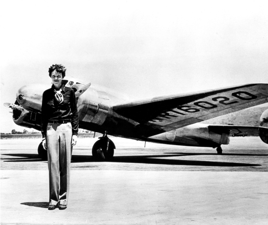 An old, black and white image of a female pilot, demonstrating that there were many women trailblazers and unsung heroes throughout our history, and they should be celebrated this Women's History Month!